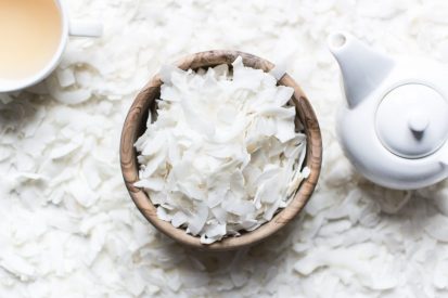 coconut-flakes-in-a-wooden-bowl-with-tea.jpg