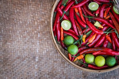 1604570516586091.jpg chili-peppers-and-limes-on-a-wooden-table.jpg